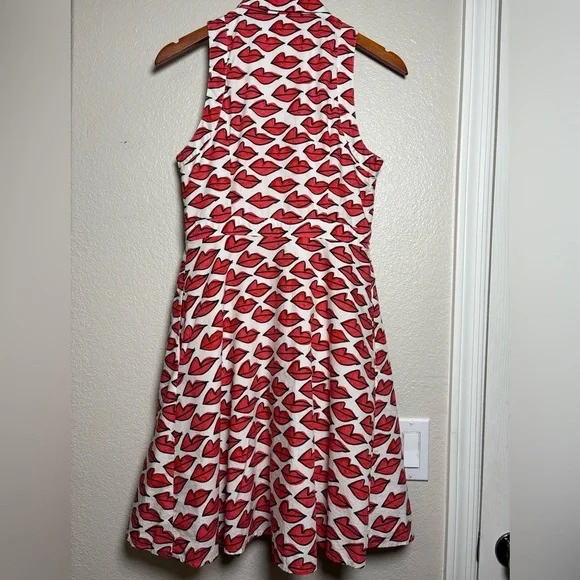 Anthropologie Red Smooch Dress. All Over Red Lip Design. Button Front. Pockets. - Picture 9 of 16